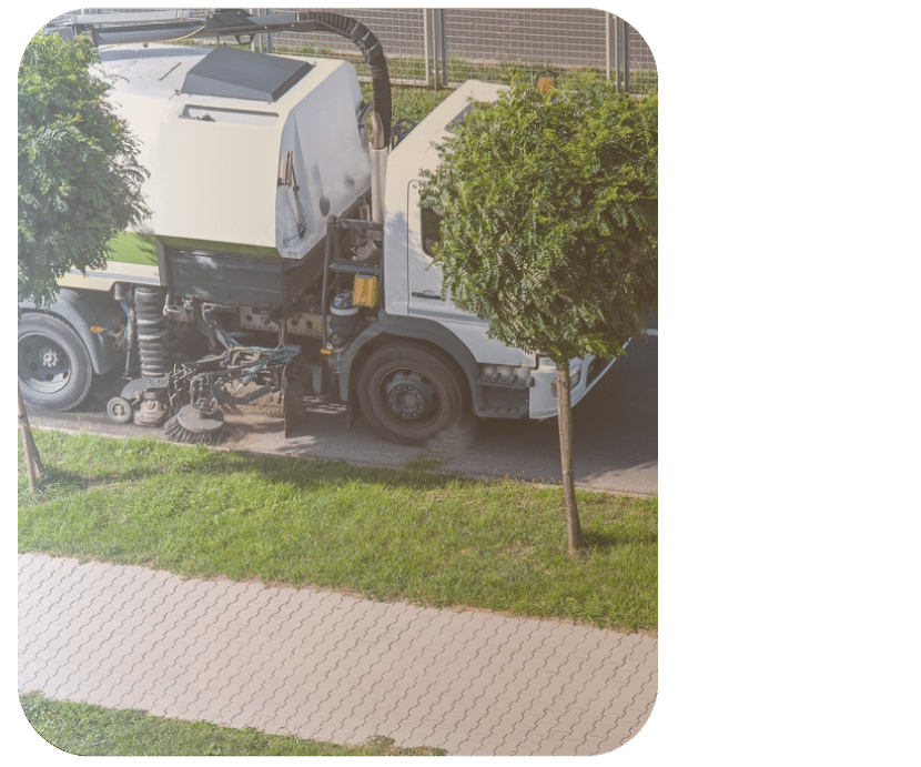 Image de camion en tournée de propreté urbaine